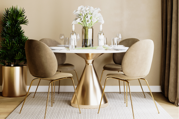 A modern gold accented dining table on a textural square rug