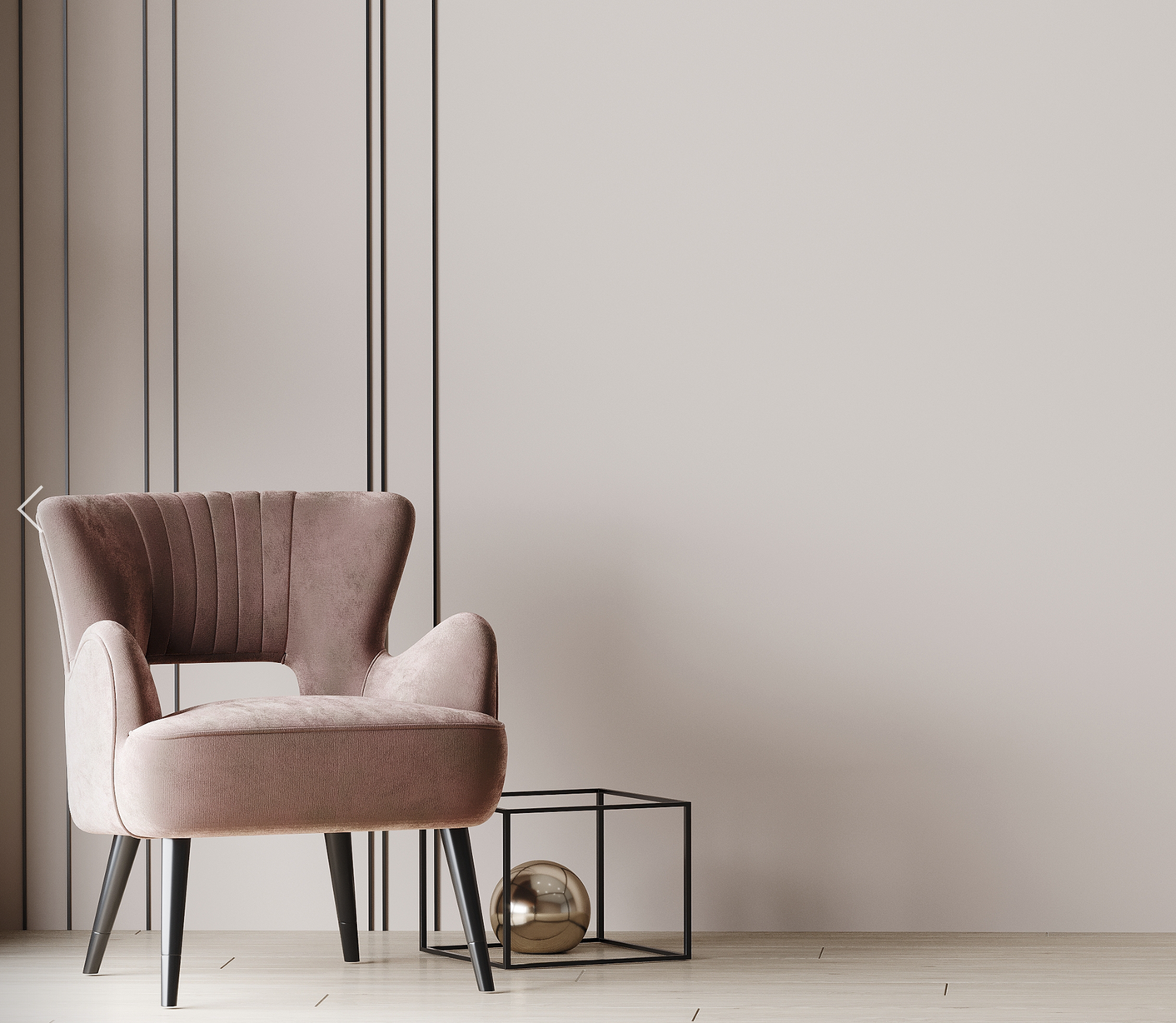 A blush pink chair next to a chrome sphere within a black framed cube